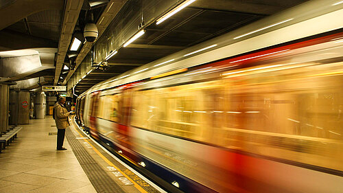 A London tube train at the platform.