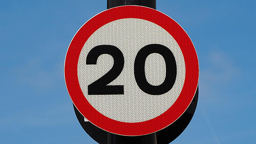 Twenty miles per hour speed sign.