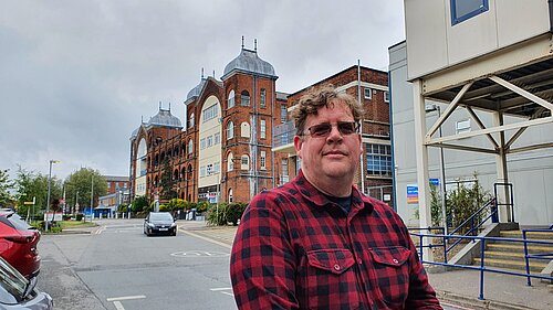 Arran Angus outside Whipps Cross Hospital